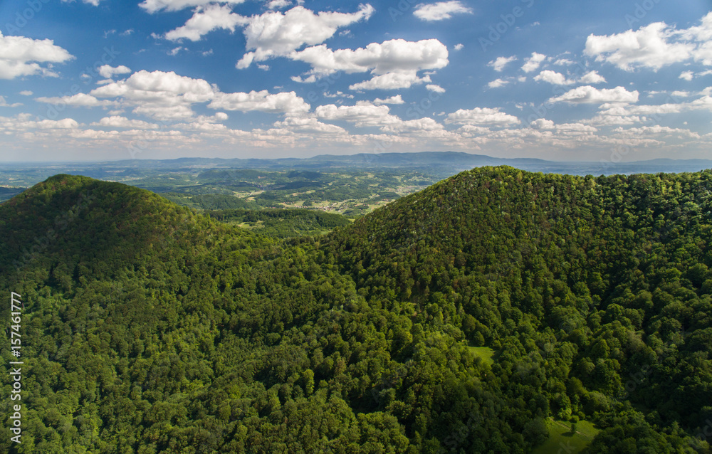 Fototapeta premium Aerial view of green hills