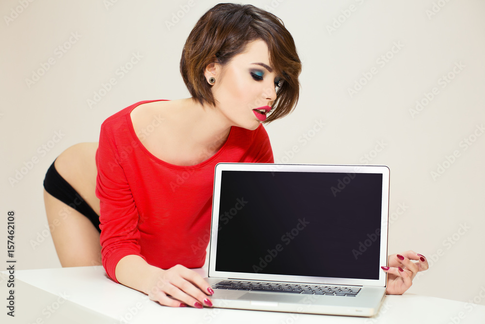 Charming model with amazing body wearing red sweater. Charming model with amazing body wearing red sweater.