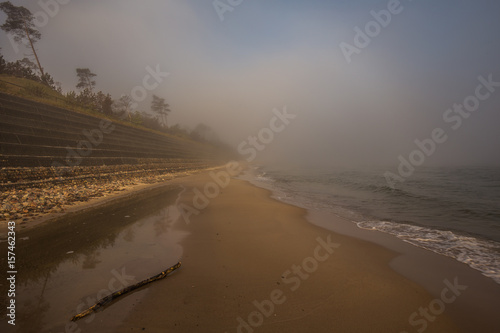 Foggy morning at the Baltic sea coast. Jastrzebia Gora, Poland