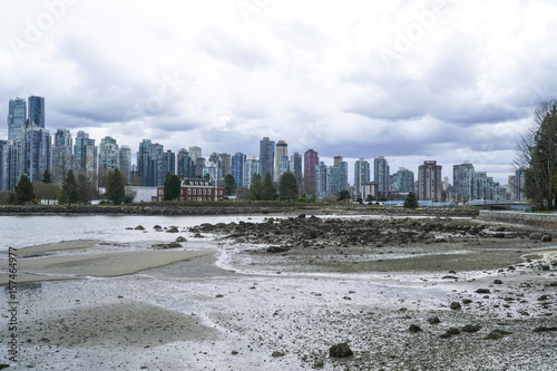Stanley Park Vancouver with a view over the skyline - VANCOUVER - CANADA - APRIL 12, 2017 © 4kclips