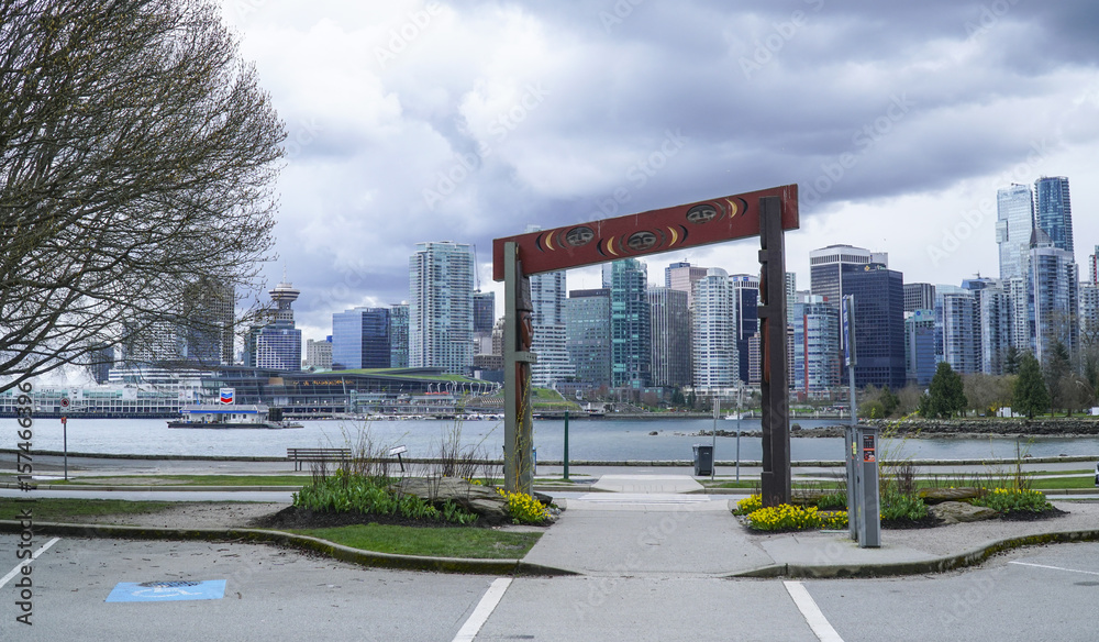 View from Stanley Park over the skyline of Vancouver - VANCOUVER - CANADA - APRIL 12, 2017 View from Stanley Park over the skyline of Vancouver - VANCOUVER - CANADA - APRIL 12, 2017