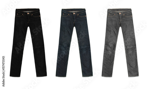 Фотография three womens jeans pants, in black, blue and grey, isolated on white background