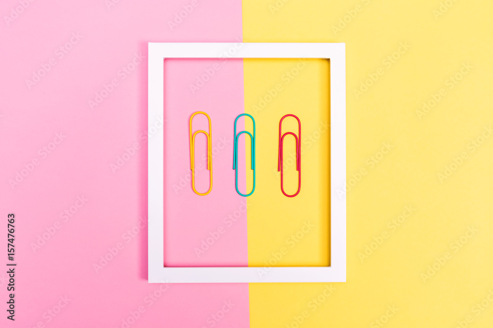 Big paper clips on a vibrant background Big paper clips on a vibrant background
