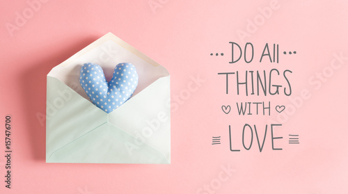 Do All Things With Love message with a blue heart cushion