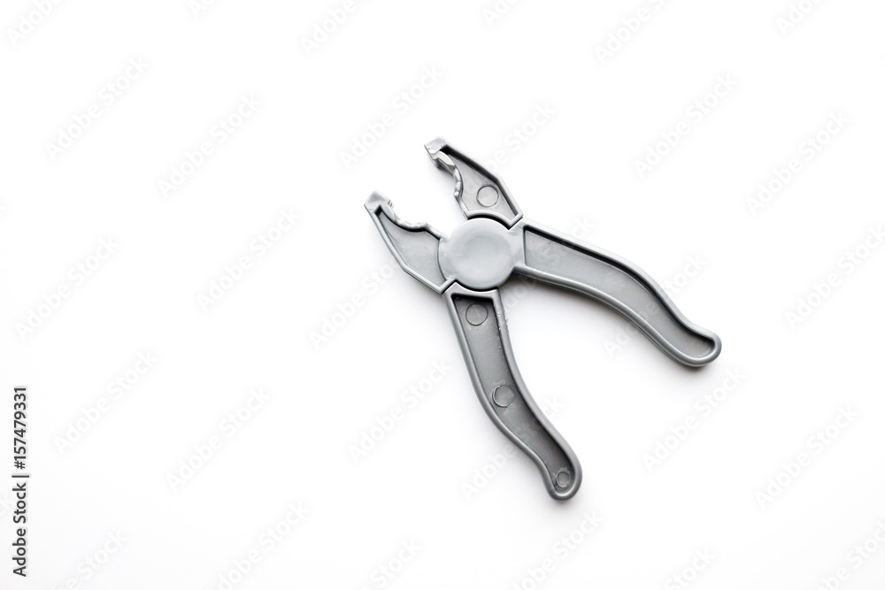 Toy tools pliers, isolated on a white background Toy tools pliers, isolated on a white background