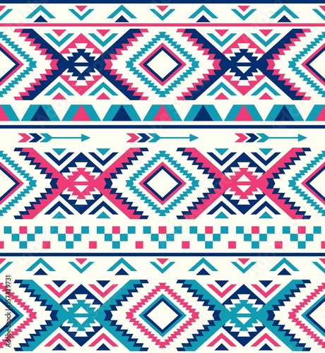 Seamless Ethnic pattern textures. Pink & Navy colors. Navajo geometric print. Rustic decorative ornament. Abstract geometric pattern. Native American pattern. Ornament for the design of clothing