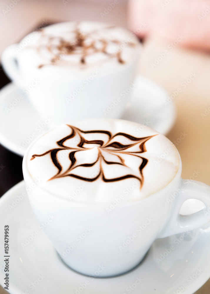 Two Italian Cappuccinos With Chocolate Design Two Italian Cappuccinos With Chocolate Design