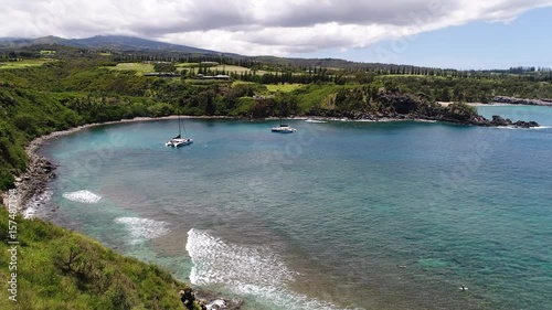 This is an aerial video of Honolua bay on Maui, Hawaii. This is a favorite bay for snorkeling, diving, and surfing. photo