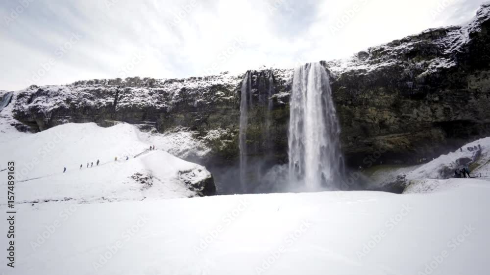 Iceland scenic landscape nature winter snow cold Seljalandsfoss waterfall water Iceland scenic landscape nature winter snow cold Seljalandsfoss waterfall water