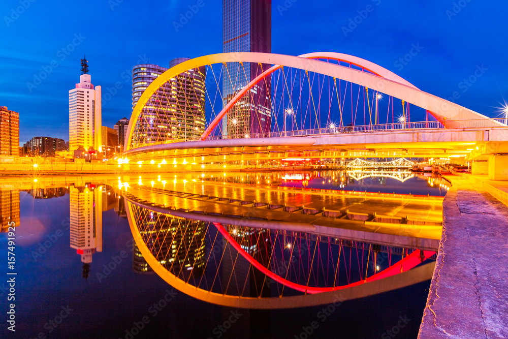 Obraz premium Downtown City skyline along the River at night in Tianjin,China.