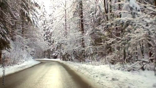 Snowy Drive on a Winding Alpine Road in High Speed Video I