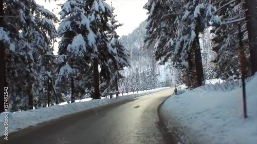 Snowy Drive on a Winding Alpine Road in High Speed V