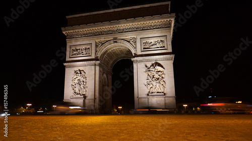 Photography Night photo of iconic Arc de Triomphe in Champs Elysees, Paris, France