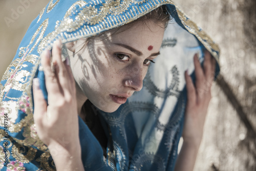 Face, sari and shadows