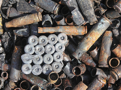 Pile of used pistol and rifle cartridges