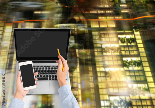 Businessman using laptop for architectural projec