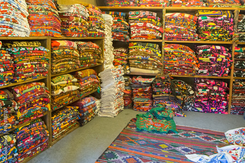 Fabric on the shelves or sale in the Grand Bazaar Istanbul Turkey