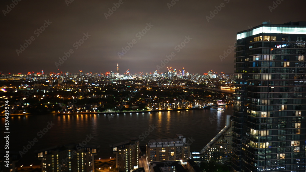 Aerial night photo of iconic Canary Warf in isle of Dogs skyline, London, United Kingdom Aerial night photo of iconic Canary Warf in isle of Dogs skyline, London, United Kingdom