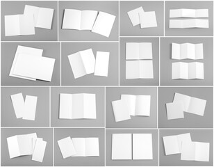 blank white folding paper flyer on orange background