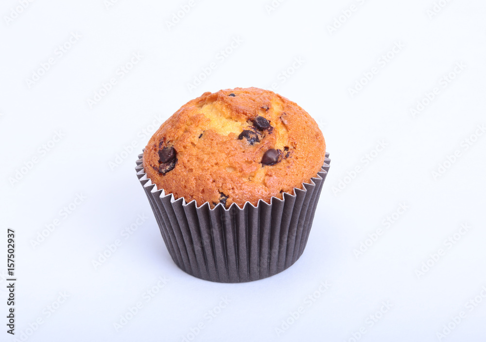 Fresh homemade muffins on white background. Top view. Fresh homemade muffins on white background. Top view.
