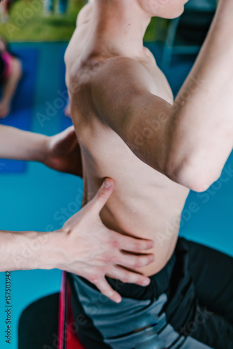 Physical Therapist with teenage boy