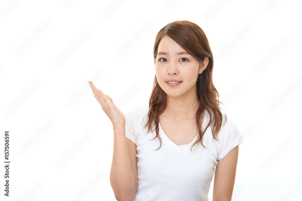案内する笑顔の女性 案内する笑顔の女性