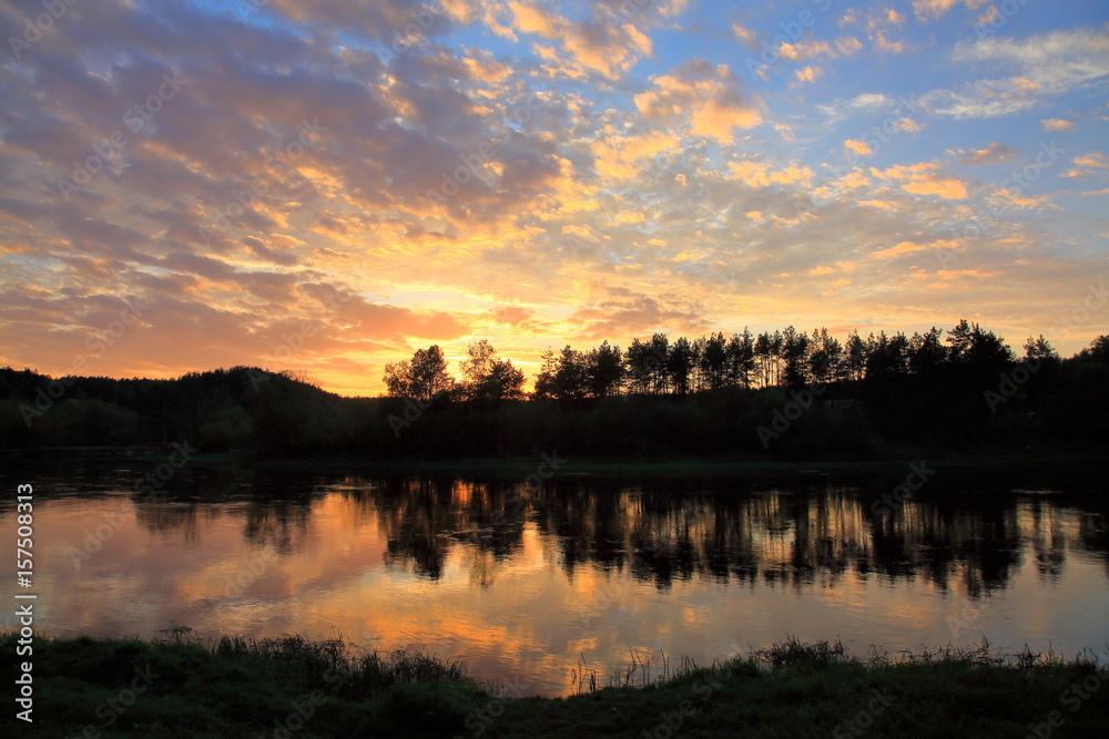 Beautiful sunset near the river Beautiful sunset near the river