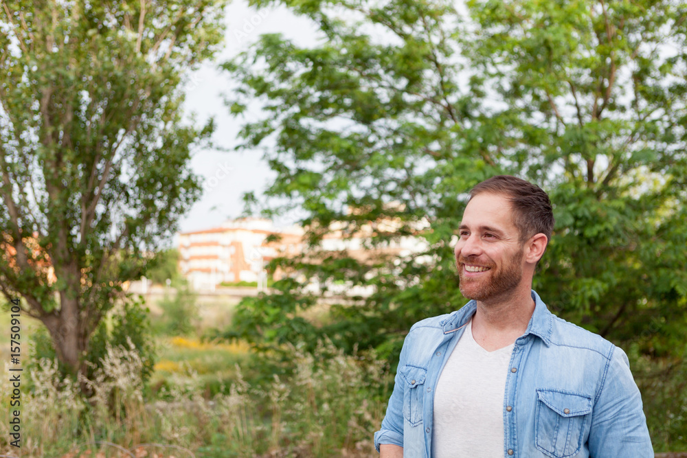 Portrait of a casual men in a park Portrait of a casual men in a park