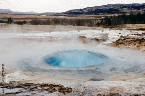 .Natural landscape of the blast process of a Geyser in Iceland.