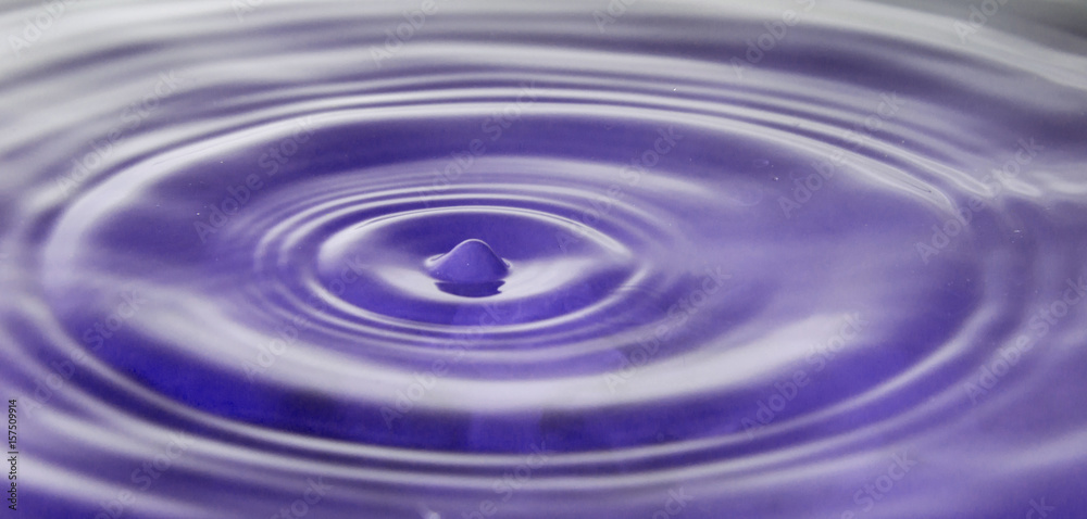 Splashes of water. Water drops. Photo of drop of a drop in water. Splashes of water. Water drops. Photo of drop of a drop in water.