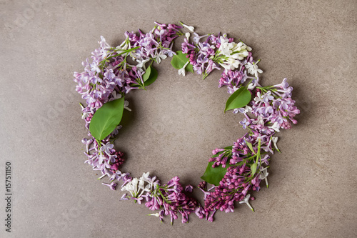 Spring flowers. Lilac flowers on  background. Top view, flat lay