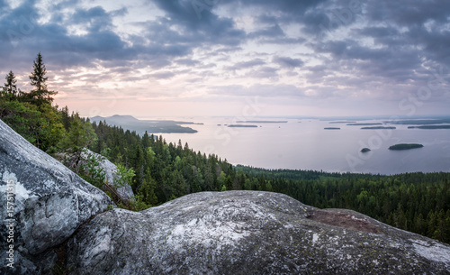 Scenic landscape with lake and sunset at evening in Koli, national park, Finland