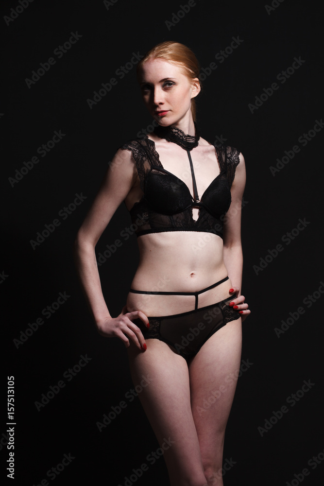 Fototapeta premium Sexy girl in underwear posing in studio