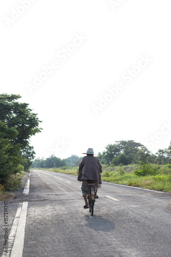 Old rural cyclist grandmother.