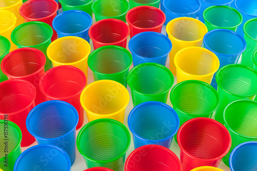 Multicolor plastic glasses isolated on white background