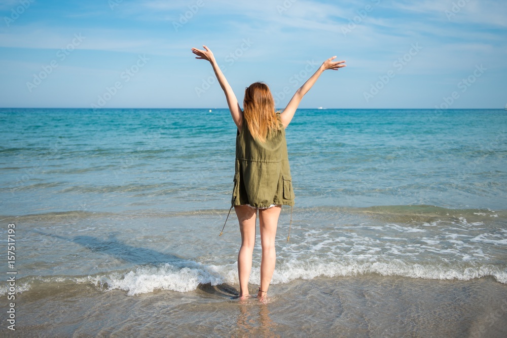 Beautiful young girl at the beach Beautiful young girl at the beach