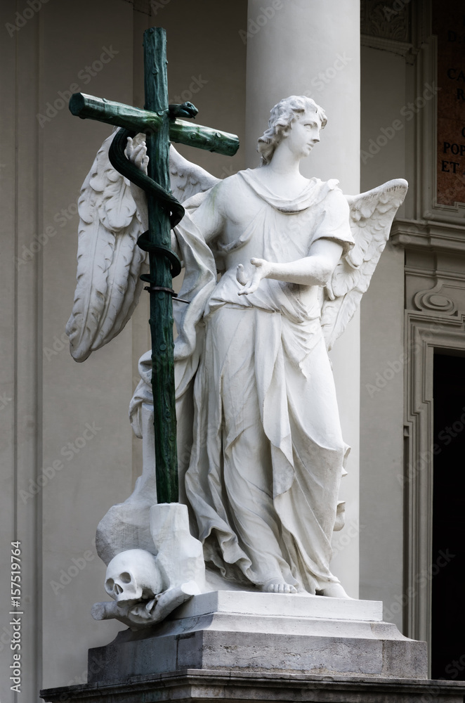Fototapeta premium Detail of the Old Testament Angel sculpture at the entrance or the Karlskirche (Saint Charles Church) in Vienna, Austria, seen from Karlsplatz