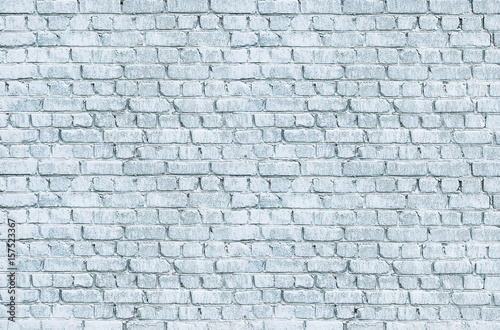Light blue painted brick wall texture. Grunge stonewall background for text or image.