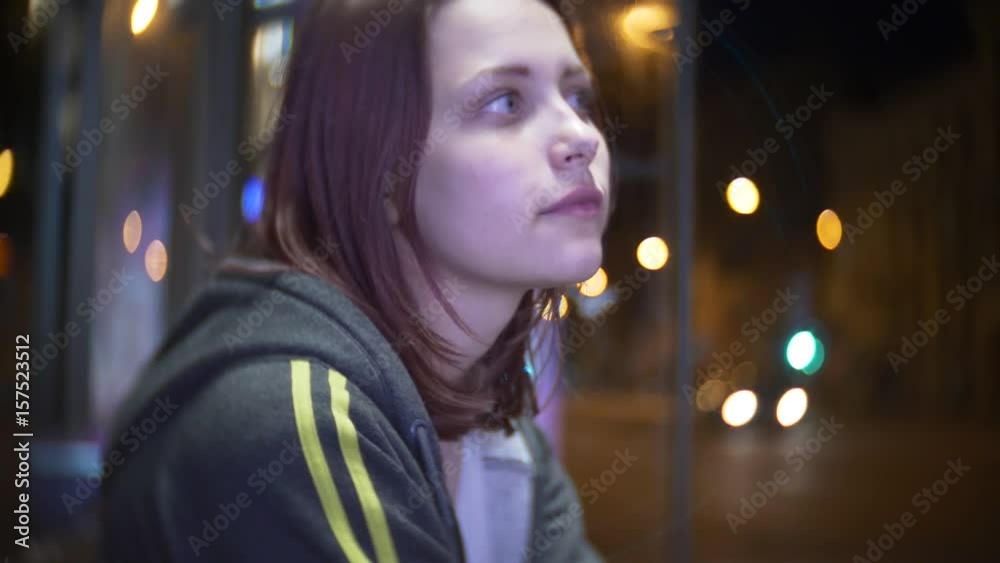 Portrait of a cute smiling teen girl on a night city street. 4K slowmo Portrait of a cute smiling teen girl on a night city street. 4K slowmo
