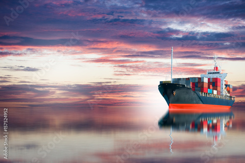 ship with container after sun set .