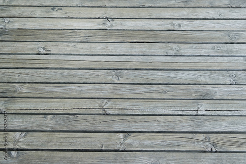 Old dark grey wooden fence background texture