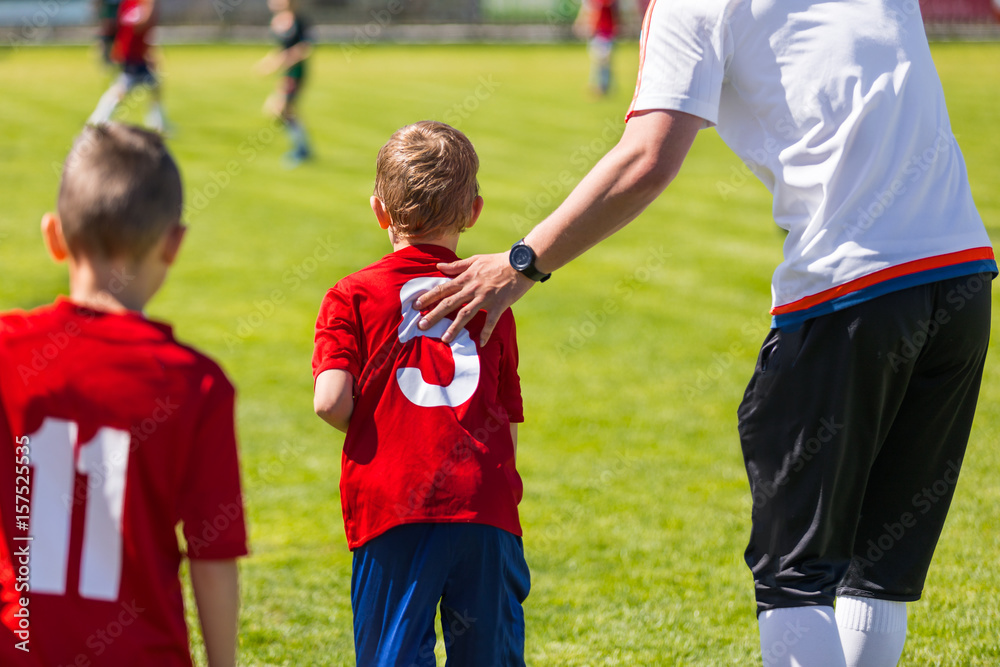 Youth Soccer Substitution. Junior Soccer Football Team Change. Coach Motivating Young Soccer Player. Coaching Children School Soccer Team Youth Soccer Substitution. Junior Soccer Football Team Change. Coach Motivating Young Soccer Player. Coaching Children School Soccer Team