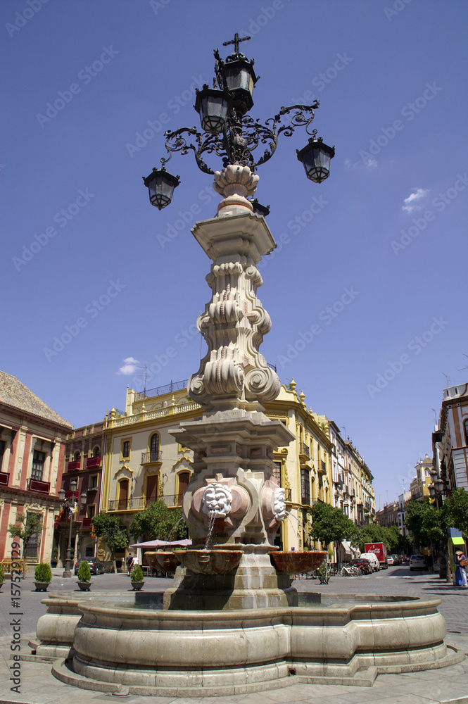 Sevilla (Spain). Fuente-lamppost in the Virgen de los Reyes square in the city of Seville