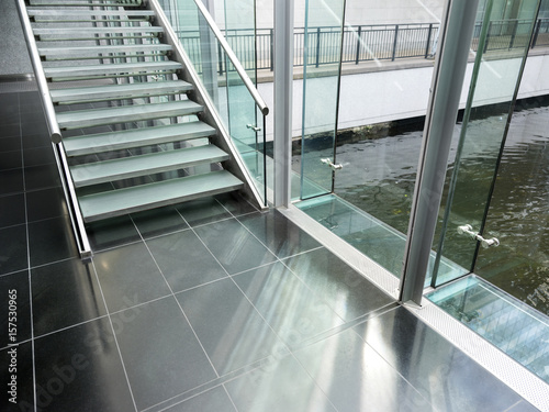 marble floor with stairs and glass pane of modern architecture