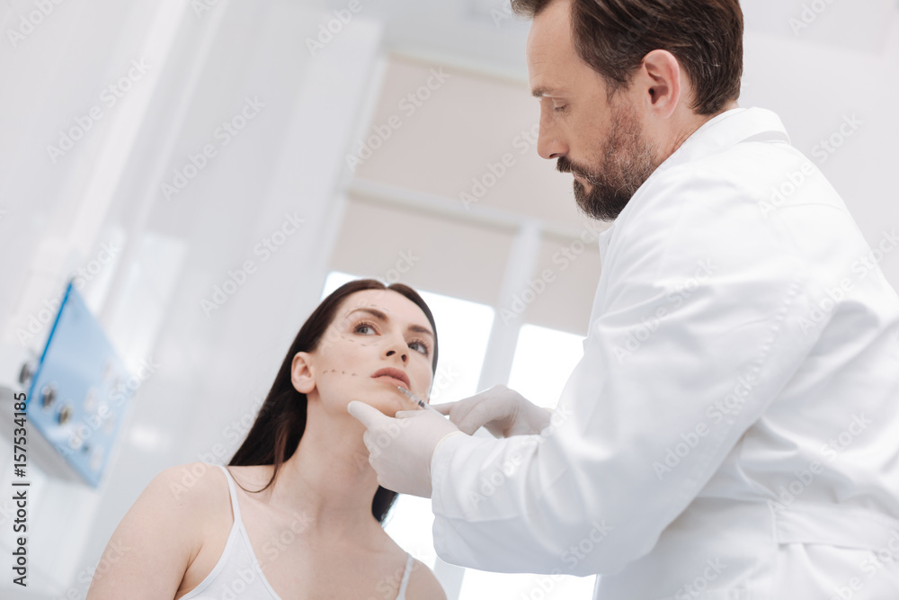 Careful leading expert altering his patients look Careful leading expert altering his patients look