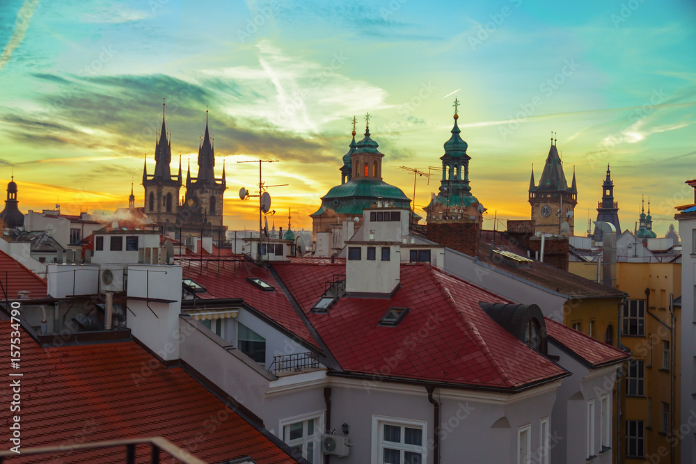 Sunset over the roofs of Prague's buildings, Czech Republic. Cityscape at sunset in the city of Prague