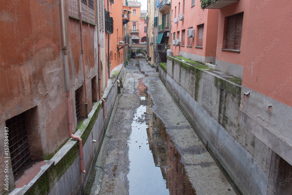 Narrow canal in Bologna downtown. Emilia Romagna , Italy.