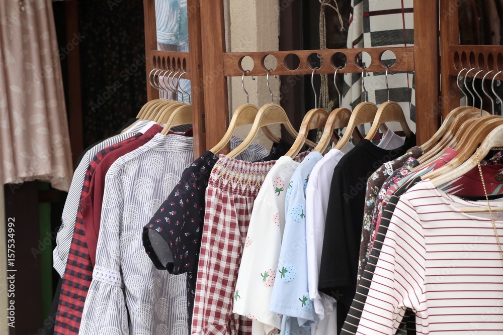 Fototapeta premium Shop clothes on hangers