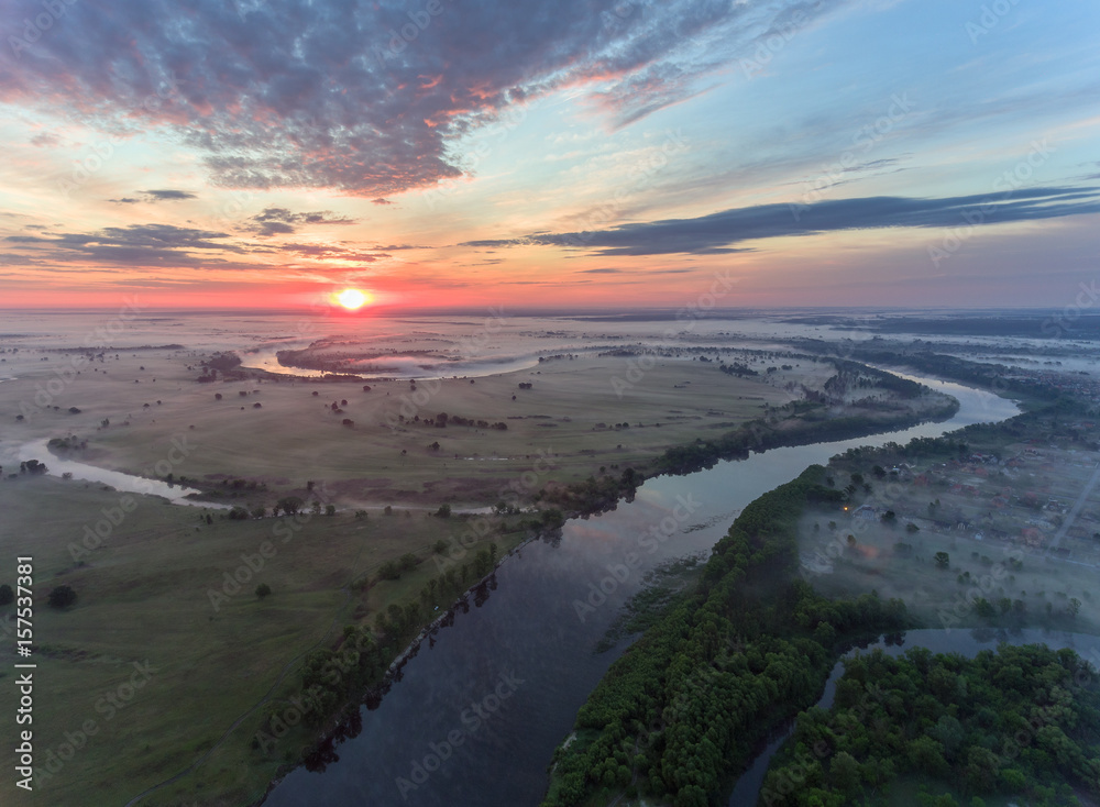 Fototapeta premium aerial view of river at sunrise