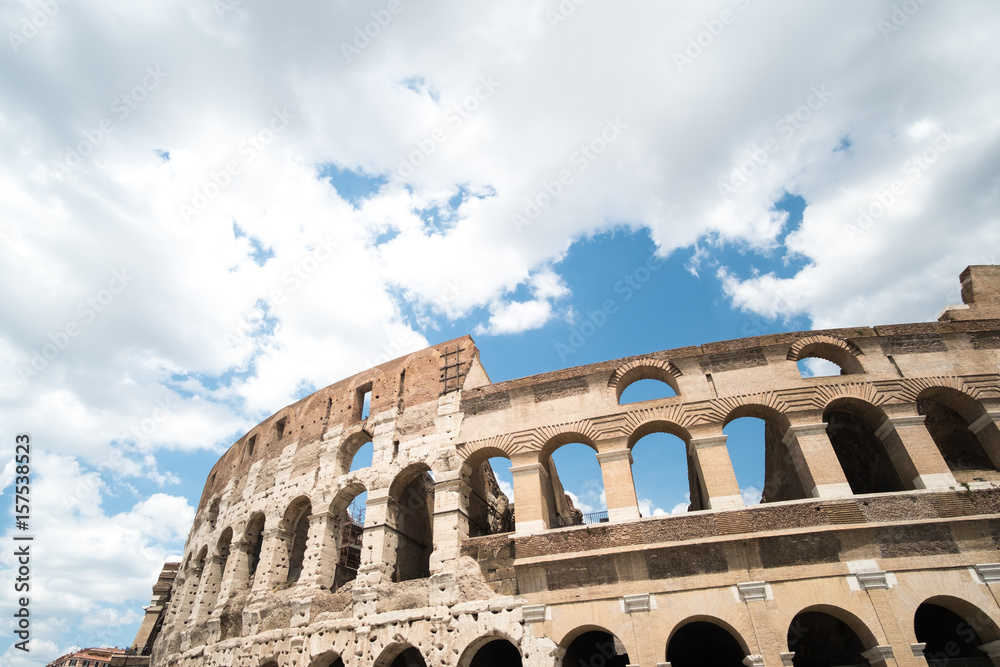 The Colosseum, an oval amphitheatre in the center of the city of Rome, Italy. It is the famous landmark built of concrete and sand.
